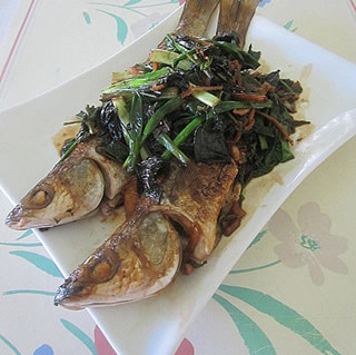 ���K����~������